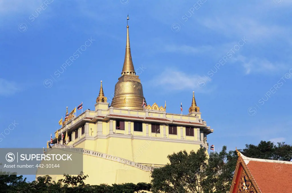Low angle view of a temple, Golden Mount, Wat Saket, Bangkok, Thailand