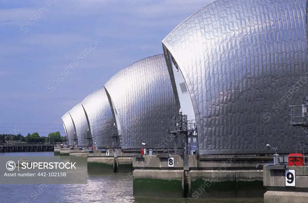 Flood barriers at the riverbank, Thames Barrier, London, England