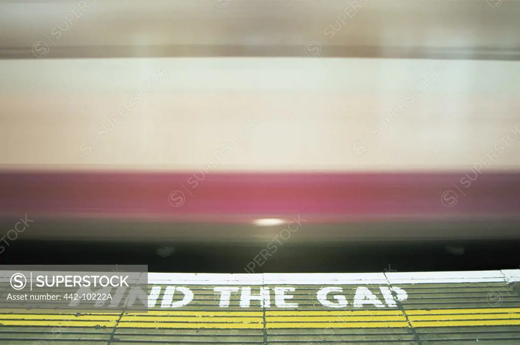 Close-up of a warning sign on a subway platform, Bank Station, London, England