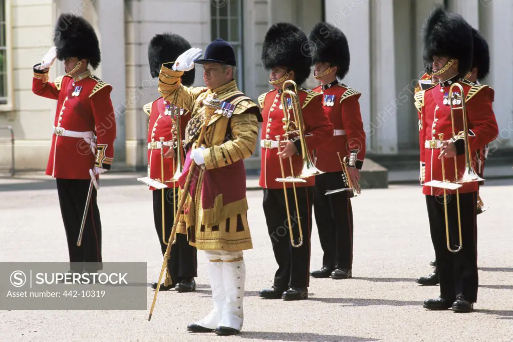 British Royal Guards standing and holding musical instruments, Changing of the Guard, London, England