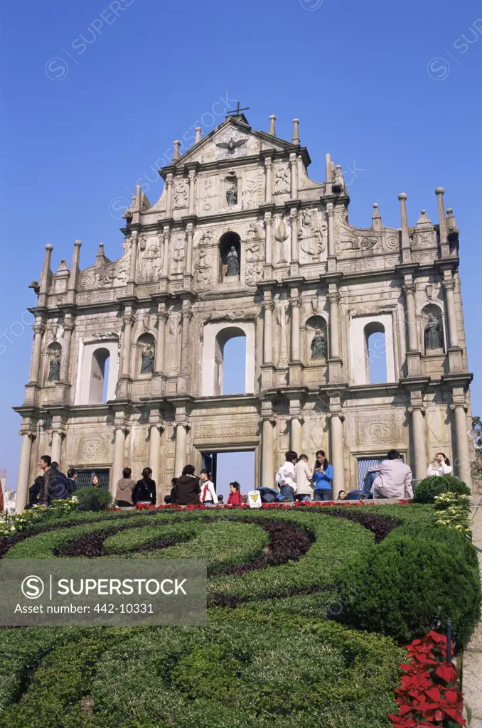 Tourists in front of a cathedral, St. Paul's Cathedral, Macao, China