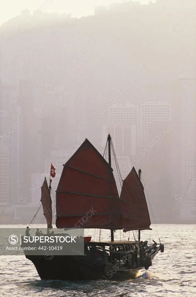 Junk ship in the sea, Victoria Harbour, Hong Kong, China