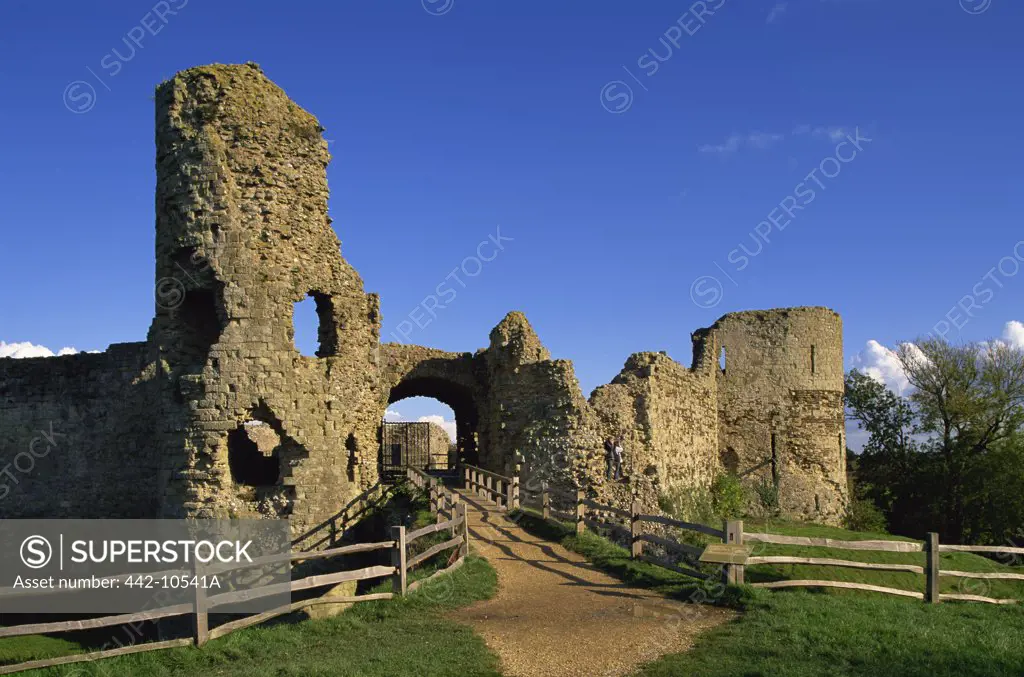 Path leading toward the entrance of a castle, Pevensey Castle, East Sussex, England