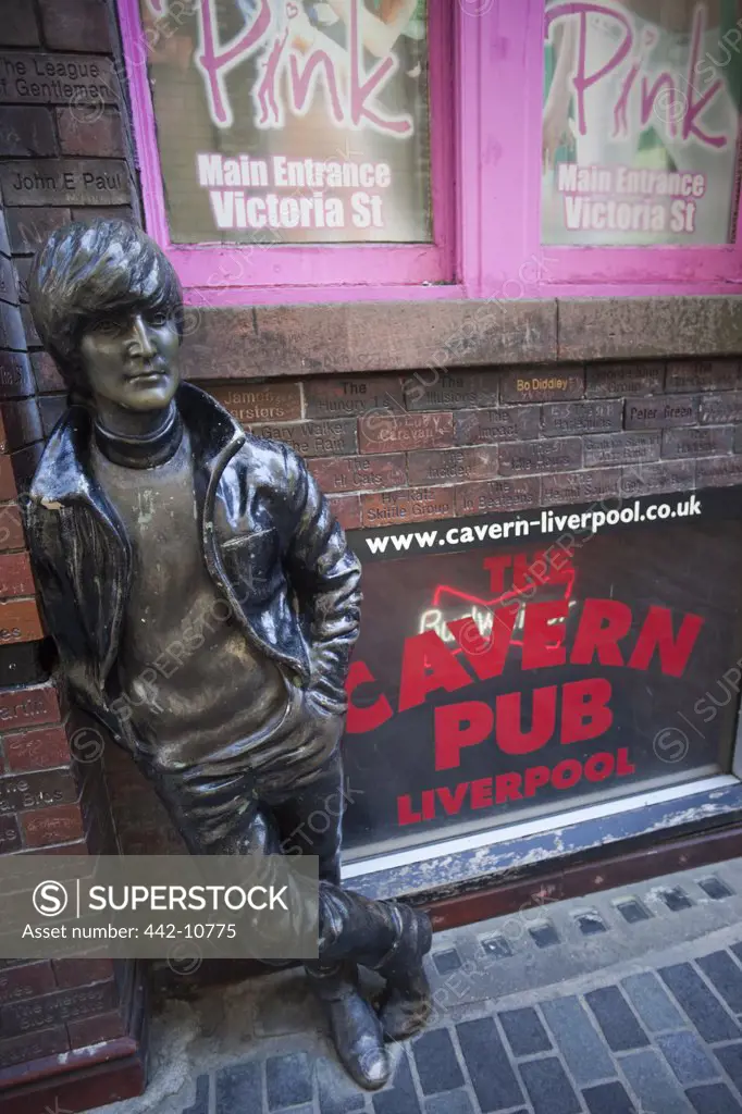 England, Liverpool, Mathew Street, John Lennon Statue and Cavern Pub Sign