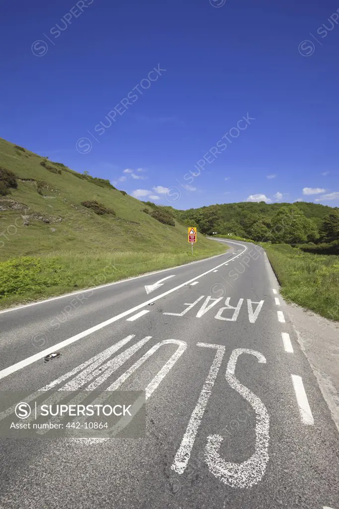 Wales, Glamorgan, Empty Road with Bilingual Sign