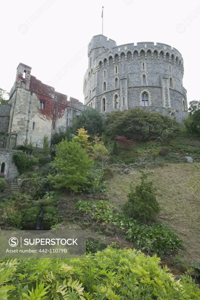 Low angle view of the round tower of a castle, Windsor Castle, Windsor and Eton, Berkshire, England
