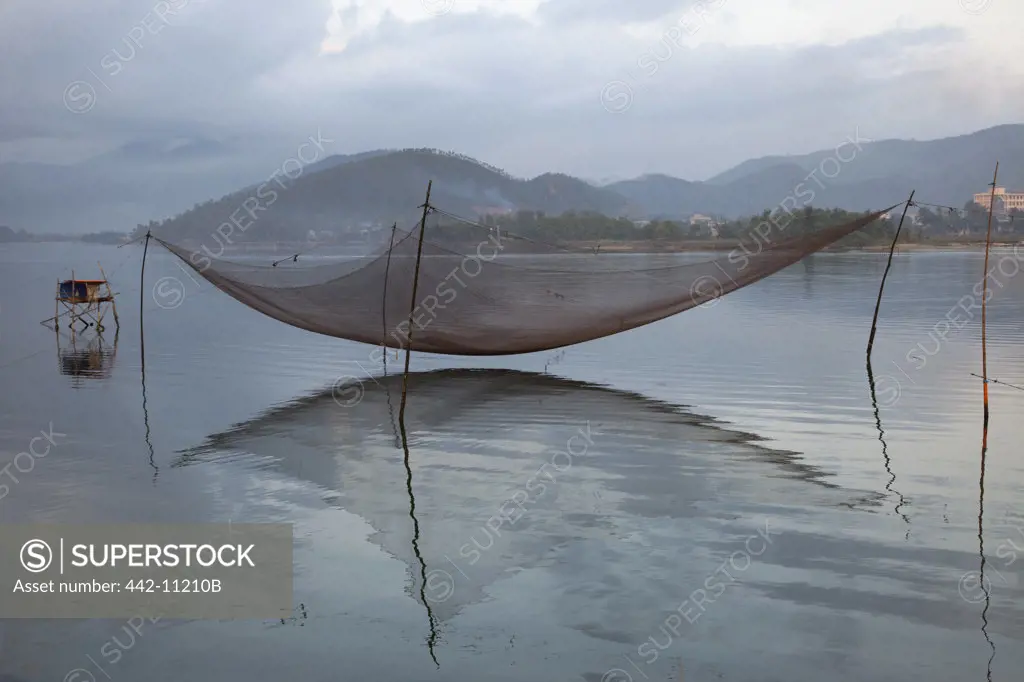 Commercial fishing net in the river, Danang, Vietnam