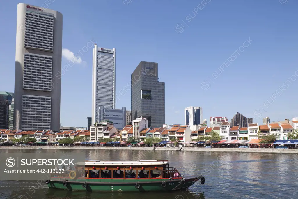 Tourboats in a river, Singapore River, Singapore City, Singapore