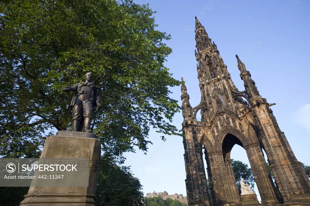 Low angle view of monuments, David Livingstone Monument, Scott Monument, Edinburgh, Scotland