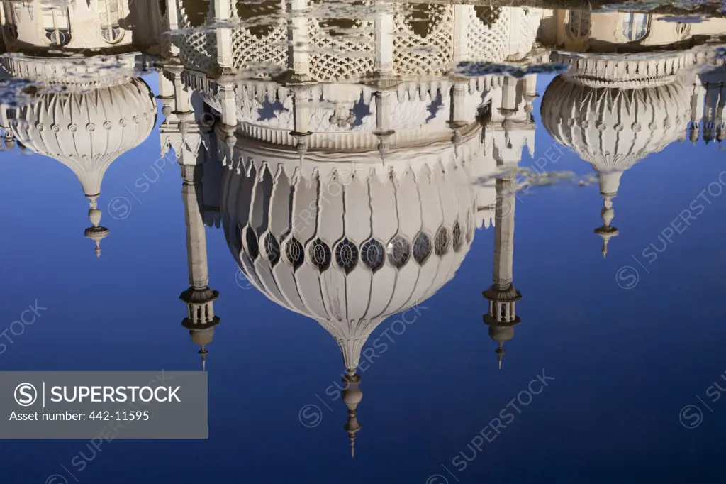 UK, England, East Sussex, Brighton, Royal Pavilion reflecting in water