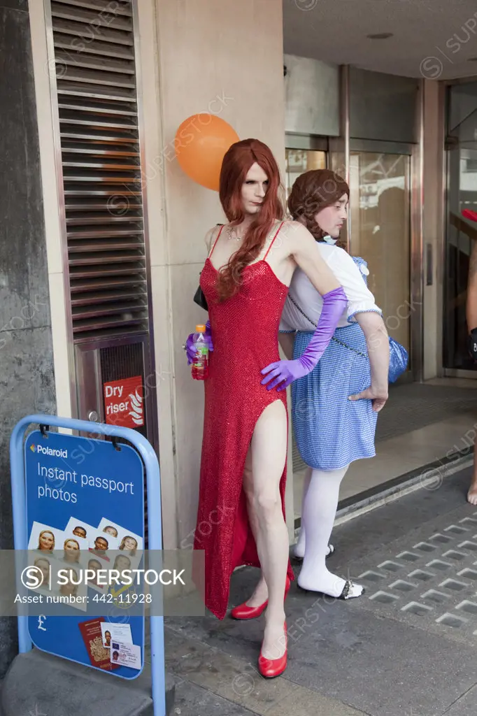 UK, England, London, Drag queens outside shop at Gay Pride Festival