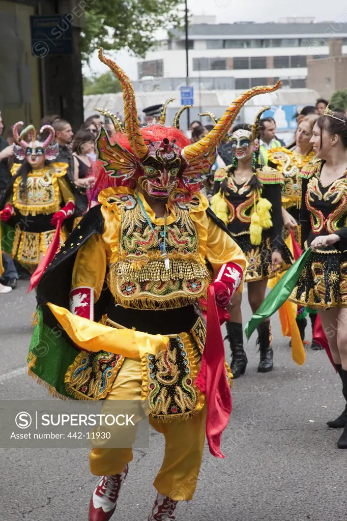 UK, England, London, Masked Bolivian participant in Carnival Del Pueblo, Carnaval Del Pueblo Festival is Europes Largest Latin Street Festival