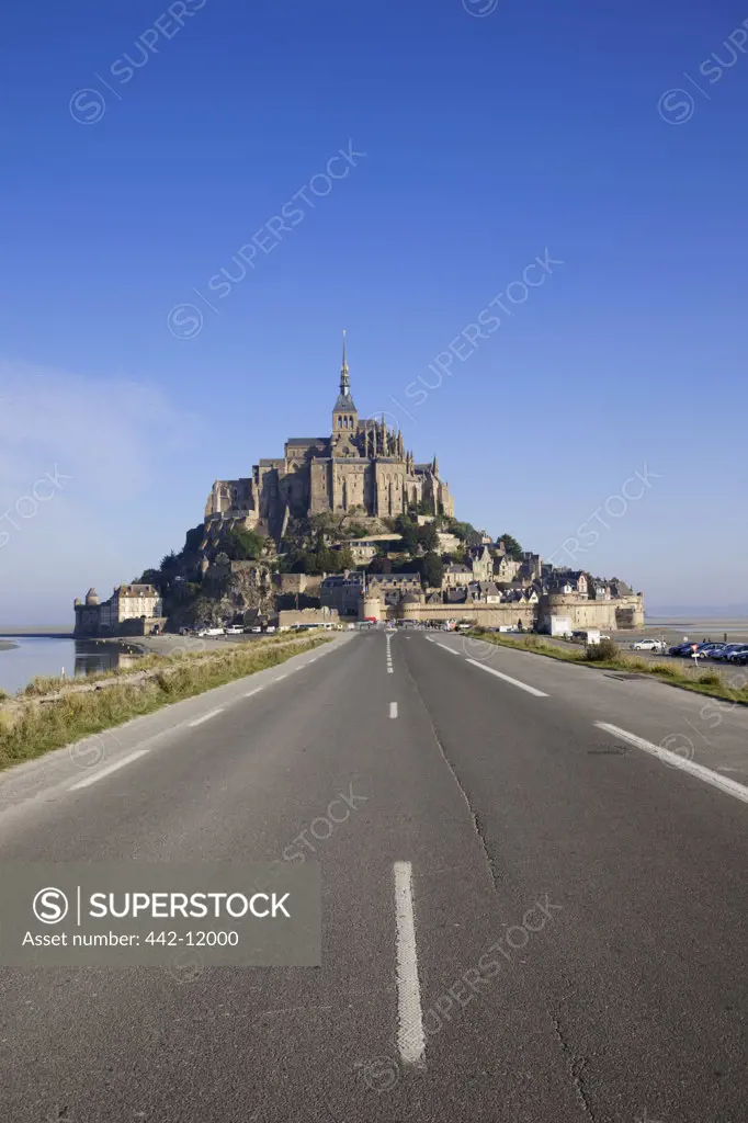 Road leading towards a cathedral, Mont Saint-Michel, Normandy, France