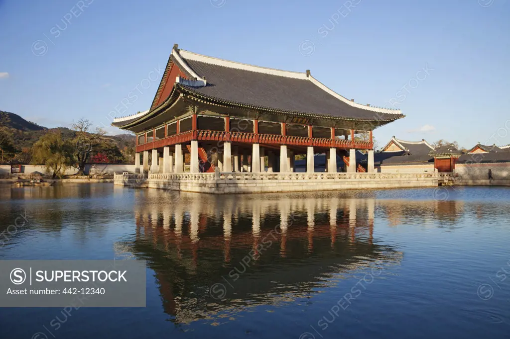 Reflection of a building in water, Gyeonghoeru Pavilion, Gyeongbokgung Palace, Seoul, South Korea