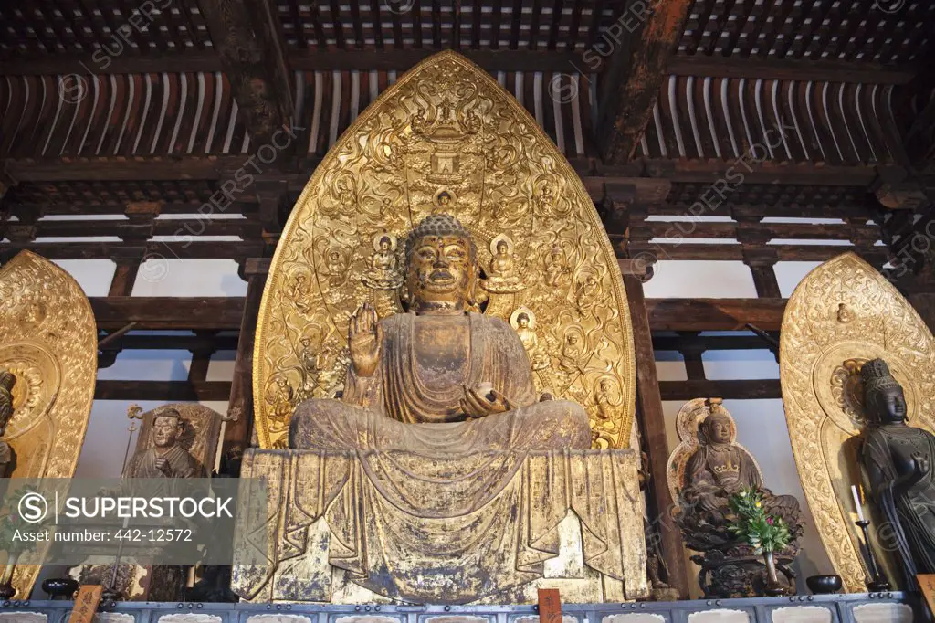 Statues of Buddha in a temple, Kofuku-ji, Nara city, Nara Prefecture, Kinki Region, Honshu, Japan