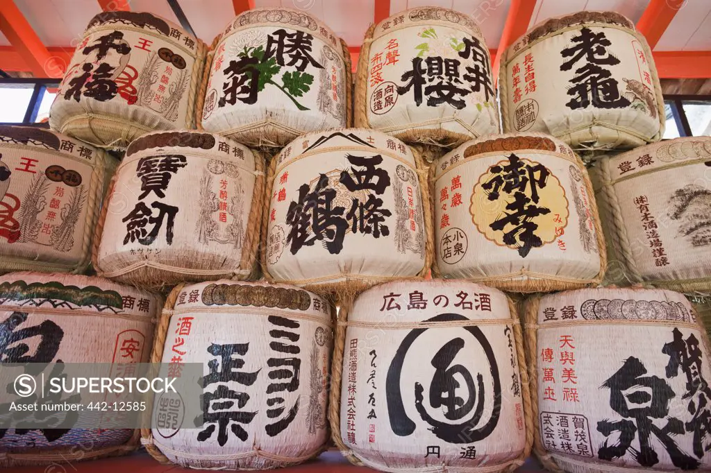 Traditional sake barrels at a shrine, Itsukushima Shrine, Miyajima, Itsukushima, Hiroshima Prefecture, Chugoku Region, Honshu, Japan