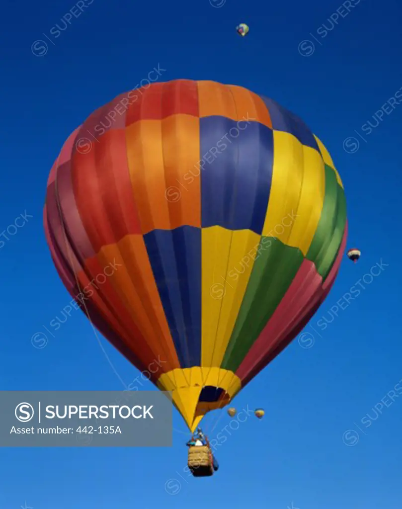 Hot air balloons rising, Albuquerque International Balloon Fiesta, Albuquerque, New Mexico, USA