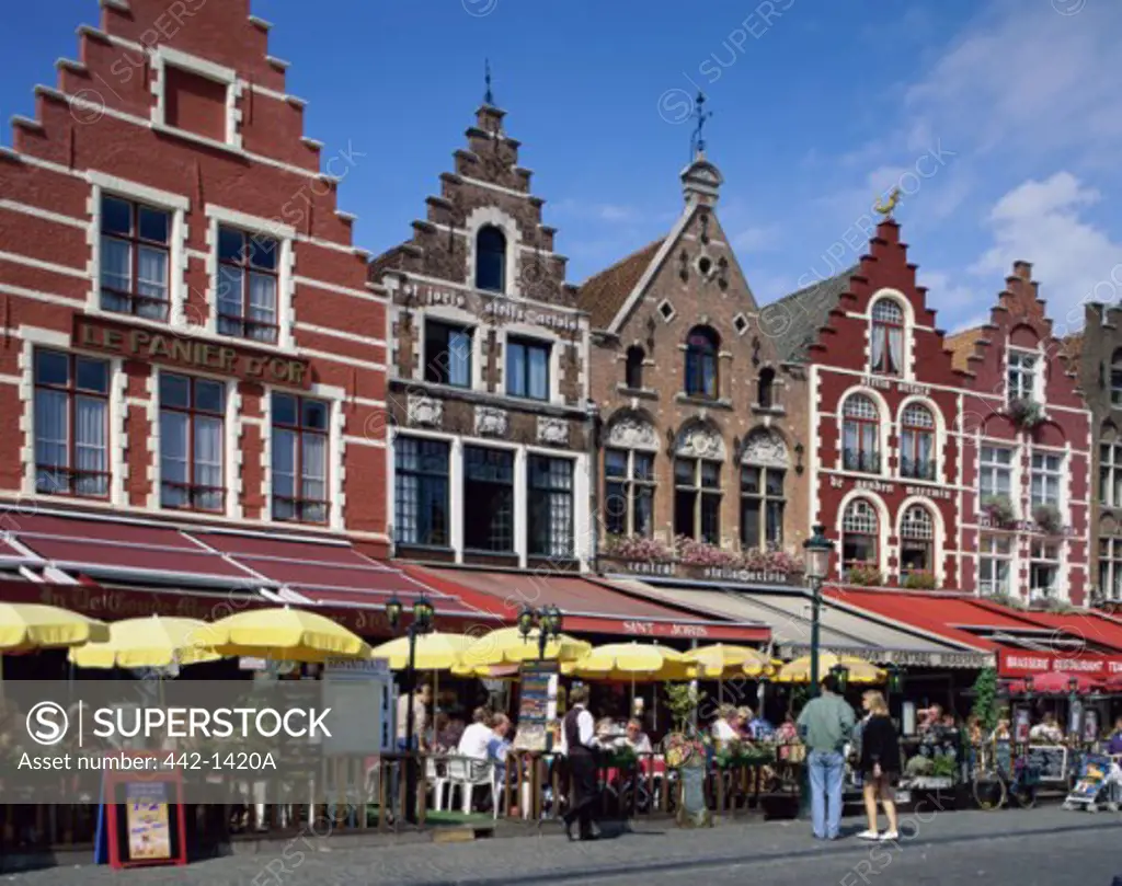 Group of people sitting at a sidewalk cafe, Grote Markt, Brugge, Belgium