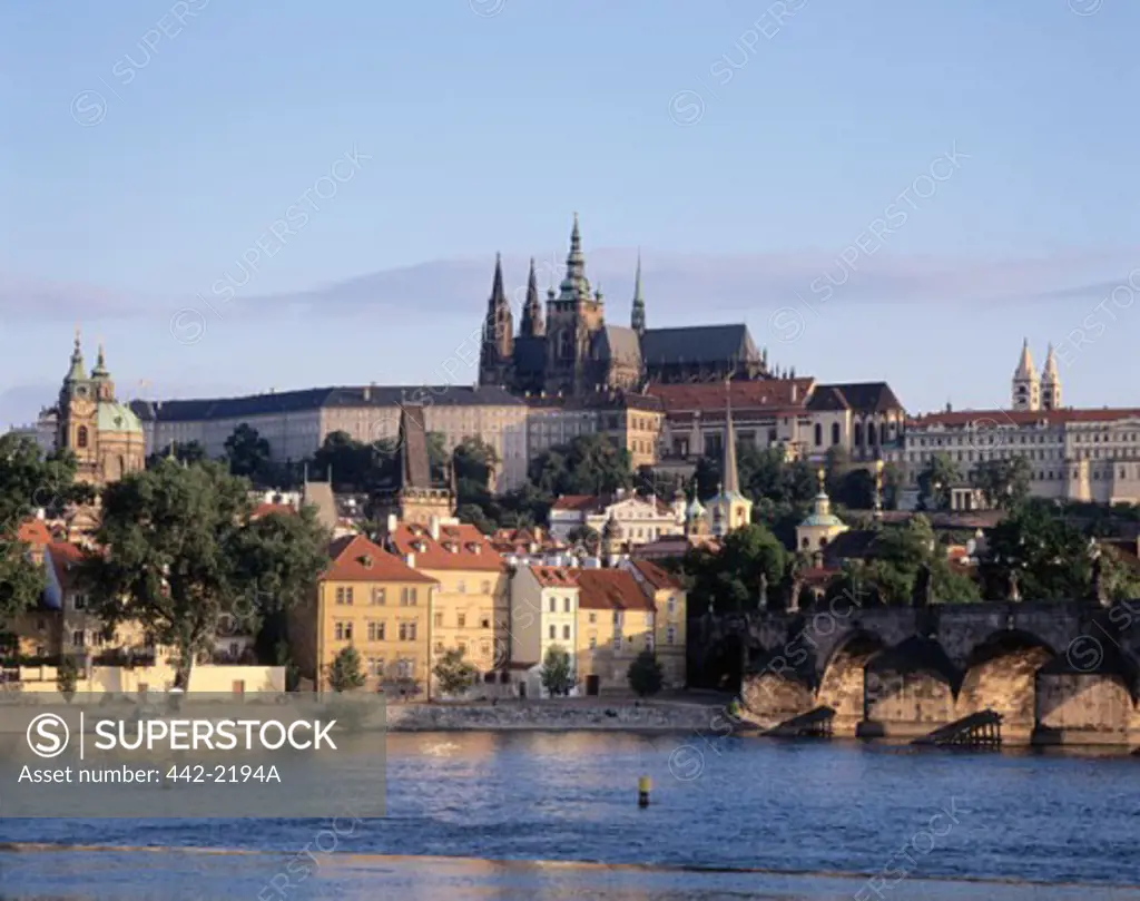 Buildings on the waterfront, St. Vitus Cathedral, Hradcany Castle, Vltava River, Prague, Czech Republic