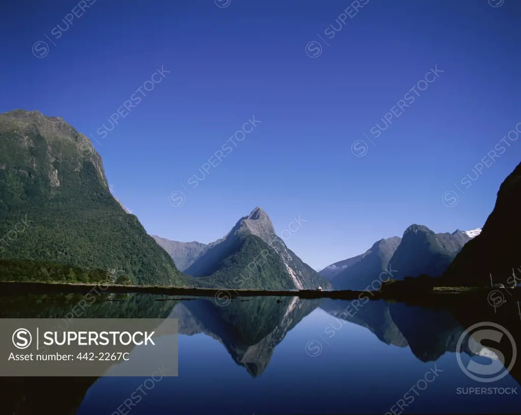 Reflection of mountains in water, Mitre Peak, Milford Sound, South Island, New Zealand