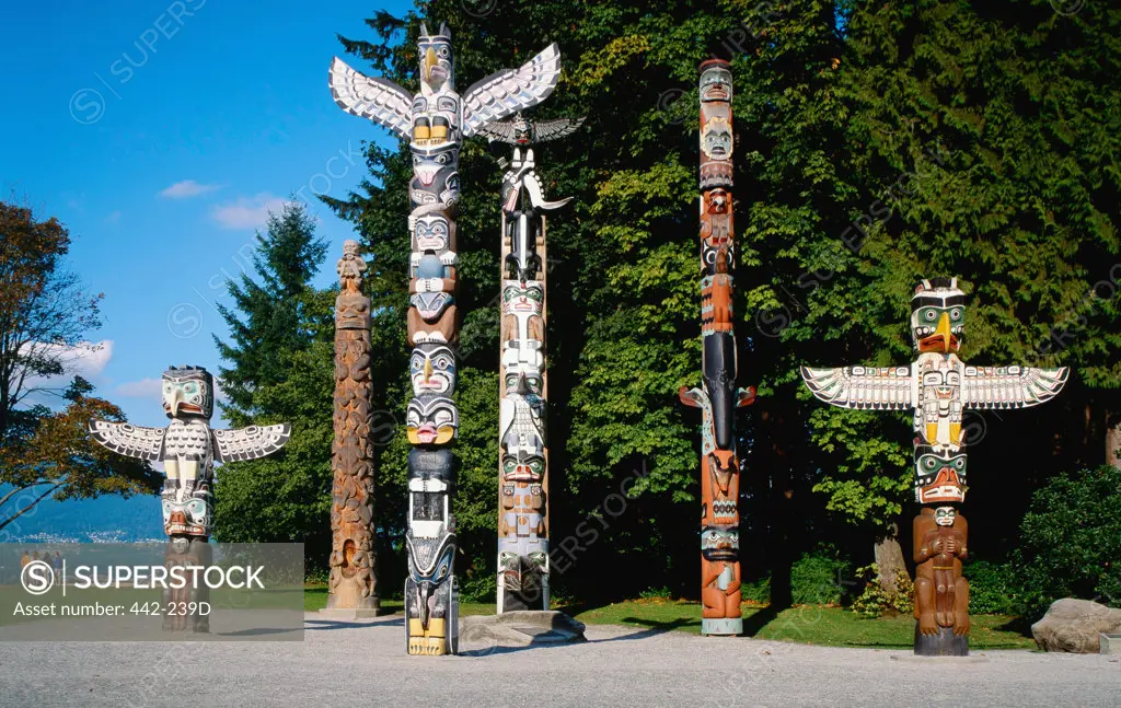 Totem poles in a park, Stanley Park, Vancouver, British Columbia, Canada