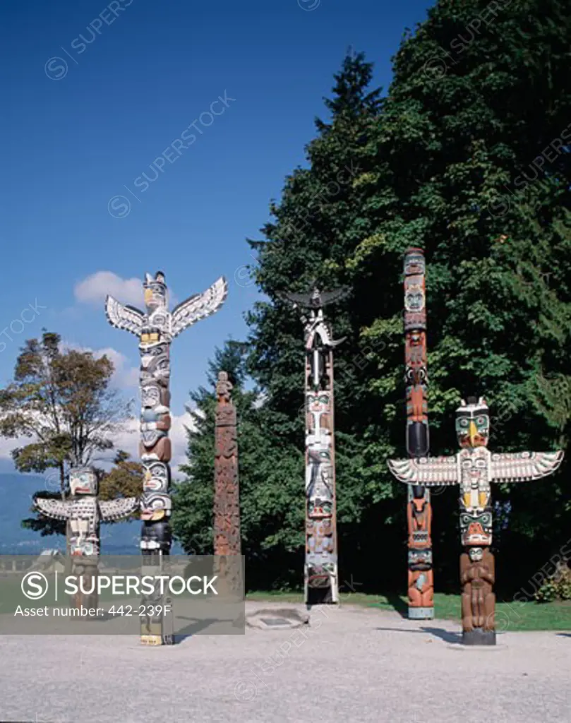Totem poles in a park, Stanley Park, Vancouver, British Columbia, Canada