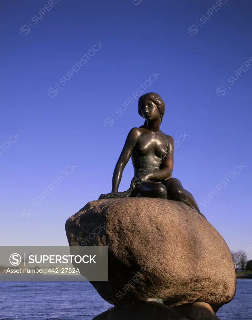 Little Mermaid statue on a rock, Copenhagen, Denmark