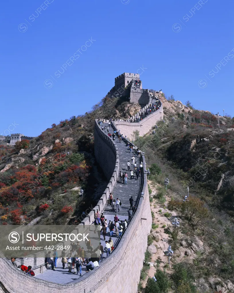 High angle view of tourists walking on a wall, Badaling Pass, Great Wall, China