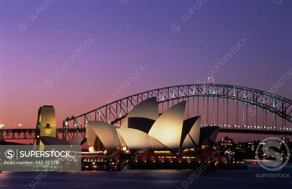 Opera house lit up at night, Sydney Opera House, Sydney Harbor Bridge, Sydney, Australia