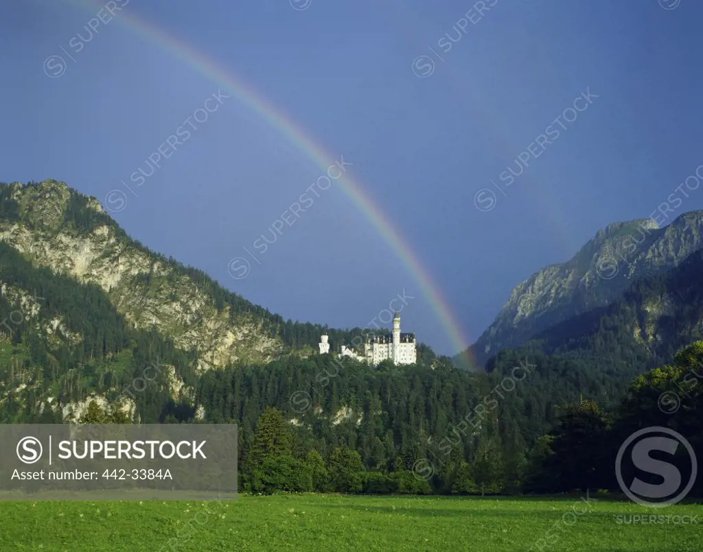 Rainbow over a castle, Neuschwanstein Castle, Bavaria, Germany