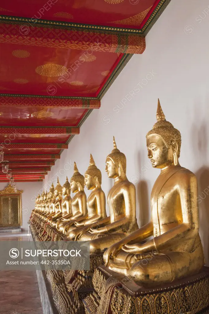 Buddha statues in a temple, Wat Pho, Bangkok, Thailand