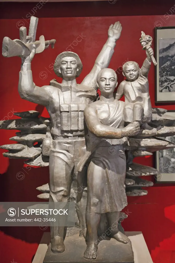 Statues of victorious soldier and family in a museum, Vietnam Military History Museum, Hanoi, Vietnam