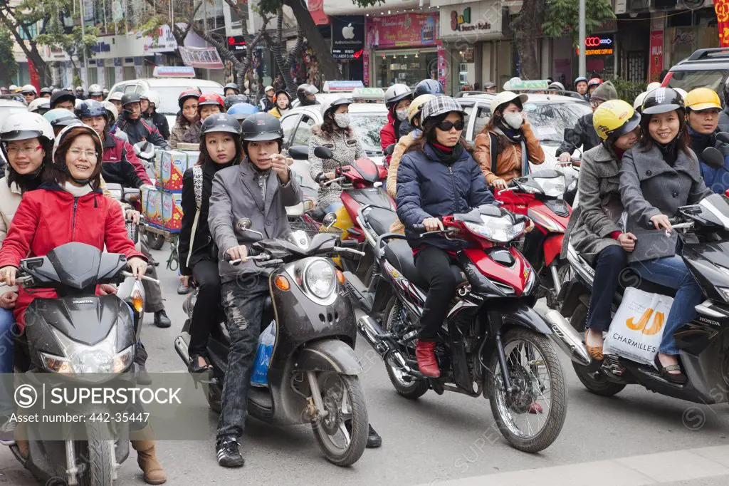 Traffic of motorbikes on the road, Hanoi, Vietnam