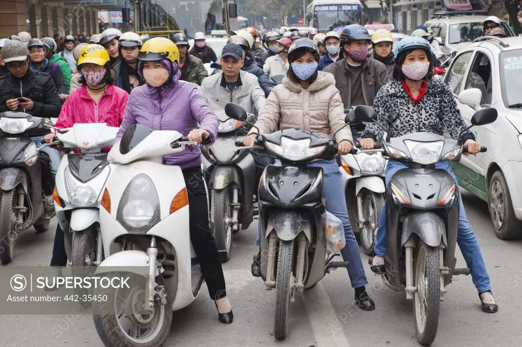 Traffic of motorbikes on the road, Hanoi, Vietnam