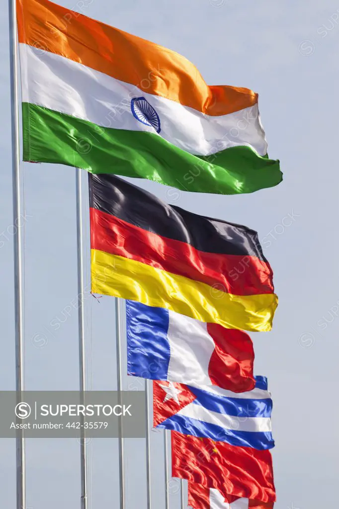 Low angle view of national flags