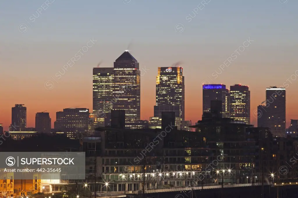Buildings lit up at dawn, Canary Wharf, Docklands, London, England