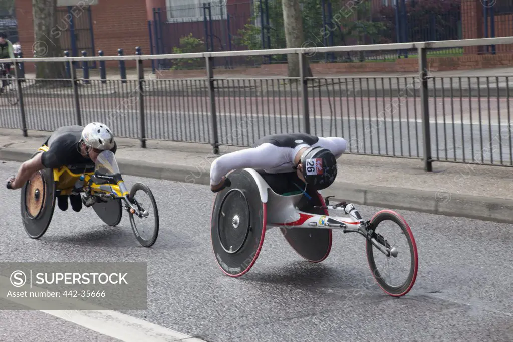 Disabled athletes in wheelchair participating in London Marathon, London, England