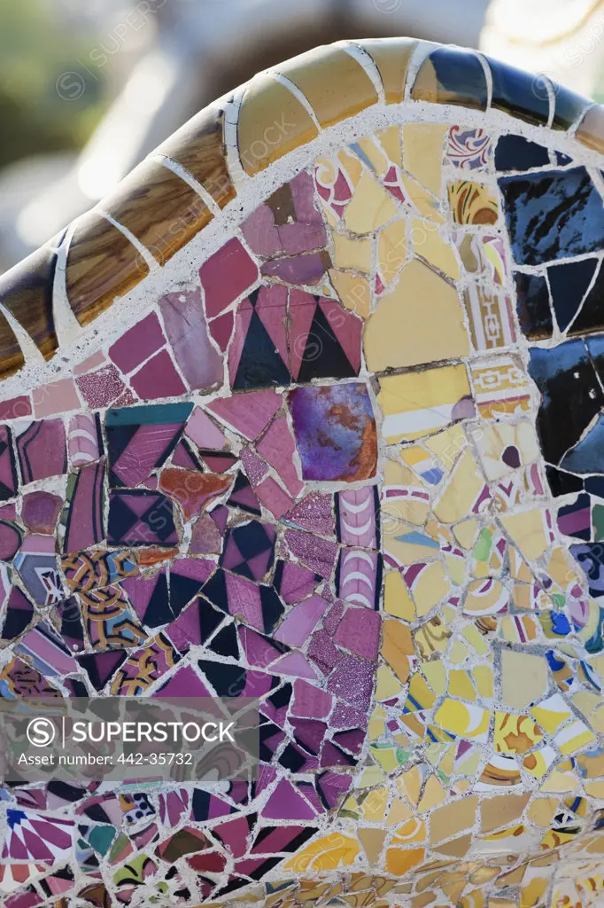 Gaudi's mosaic detail on the terrace seats, Parc Guell, Barcelona, Catalonia, Spain