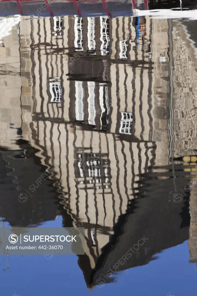 France, Brittany, Cotes-D'Armor, Dinan, Reflection of building in water