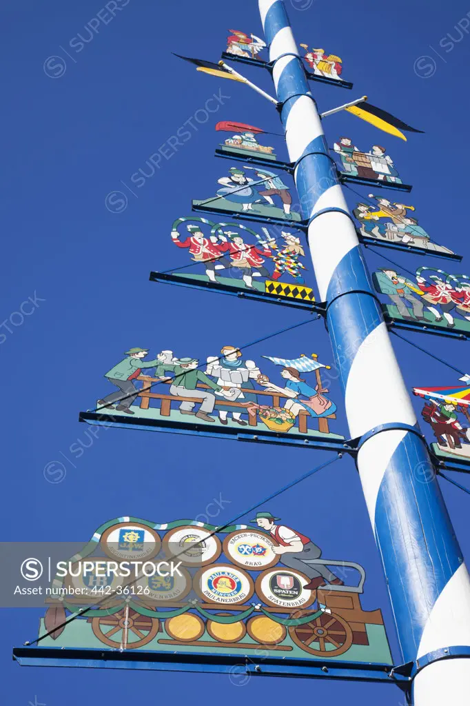 Low angle view of a maypole at Viktualienmarkt, Munich, Bavaria, Germany