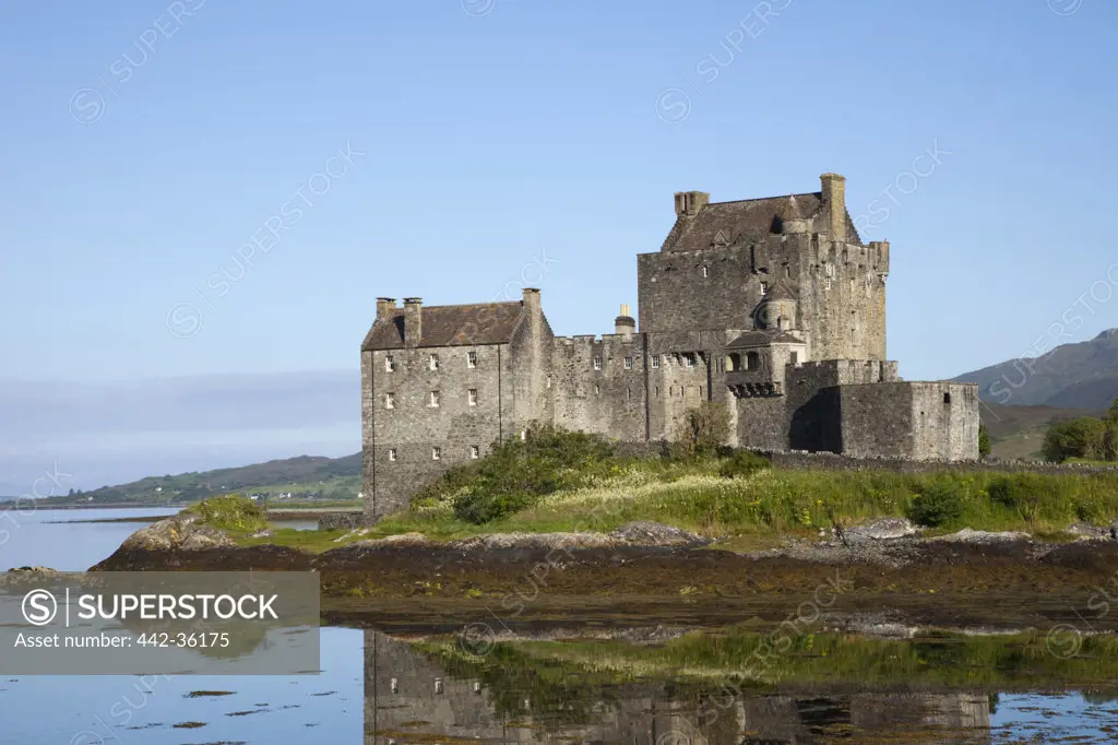 Reflection of Eilean Donan Castle in Loch Duich lake, Highlands Region, Scotland