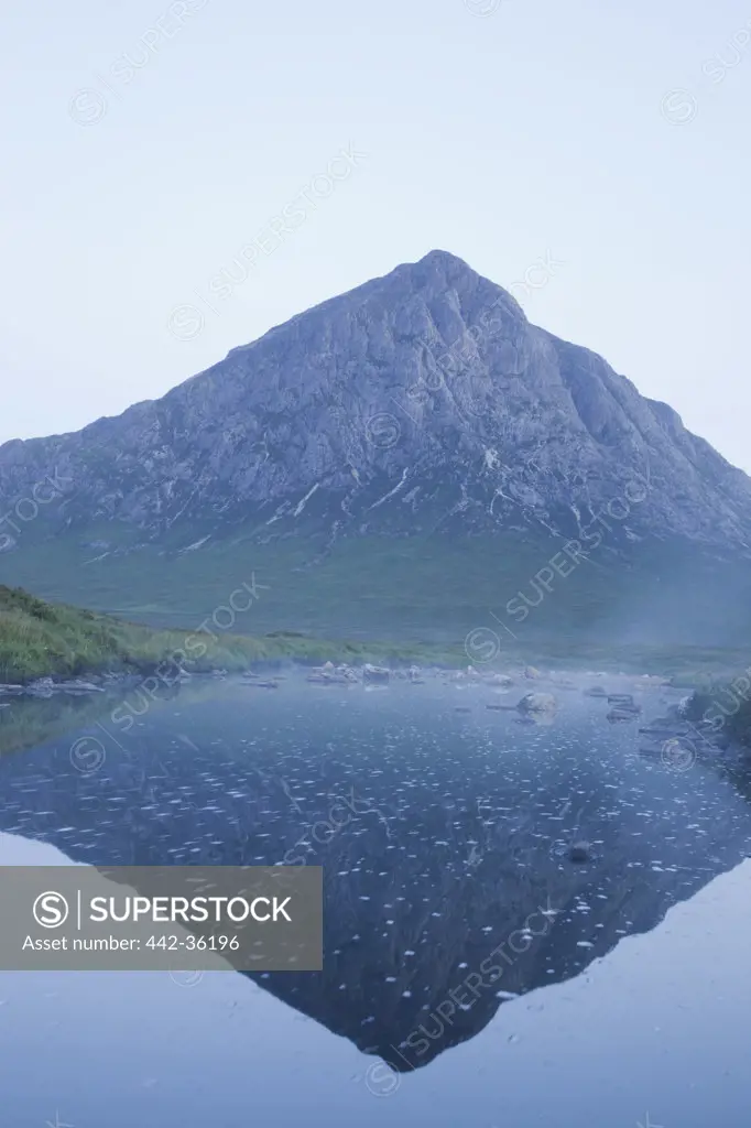 Reflection of mountain in water, Buachaille Etive Mor, Glencoe, Highlands Region, Scotland