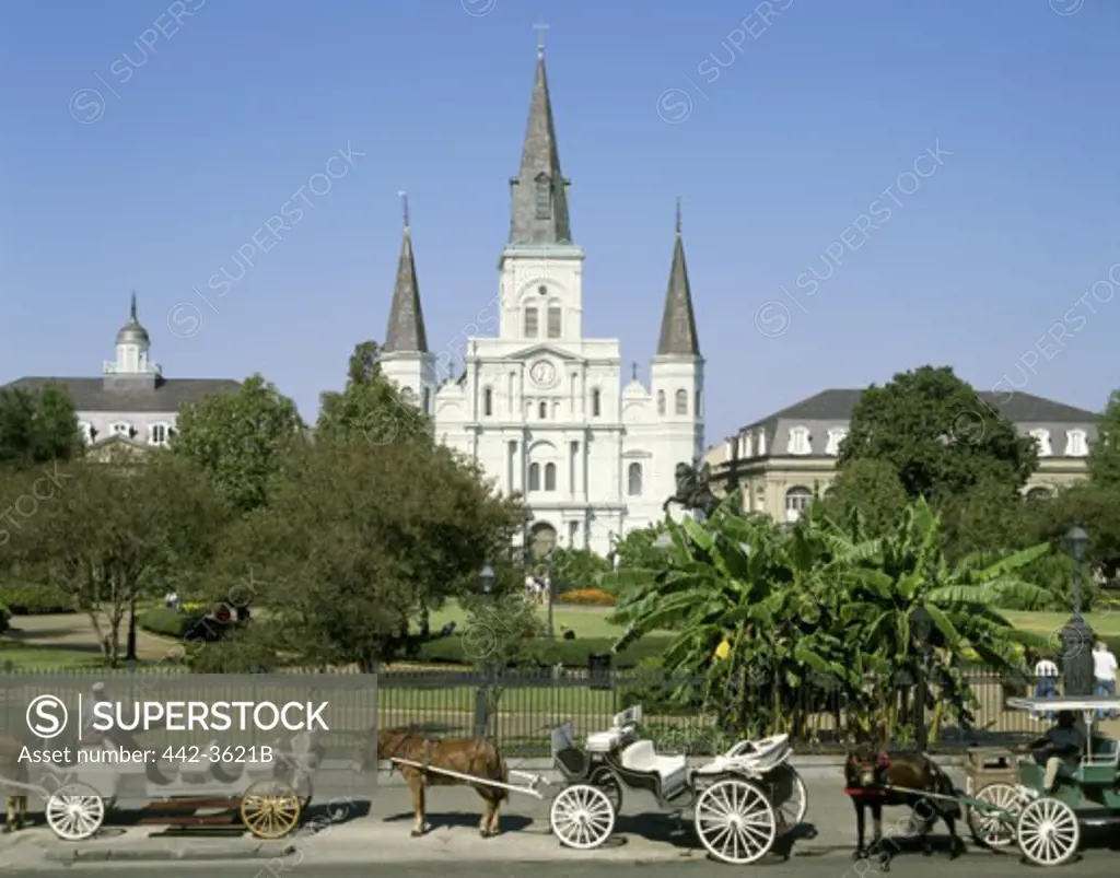 Carriages in front of a cathedral, St. Louis Cathedral, Jackson Square, New Orleans, Louisiana, USA