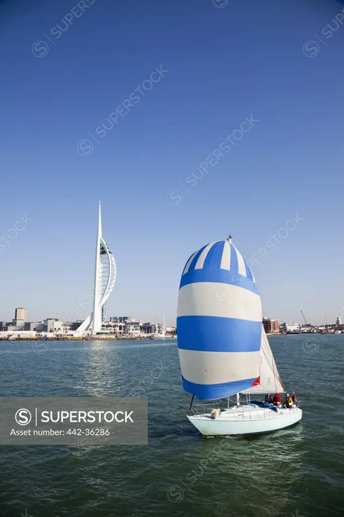 Yacht with tower in the background, Spinnaker Tower, Portsmouth, Hampshire, England