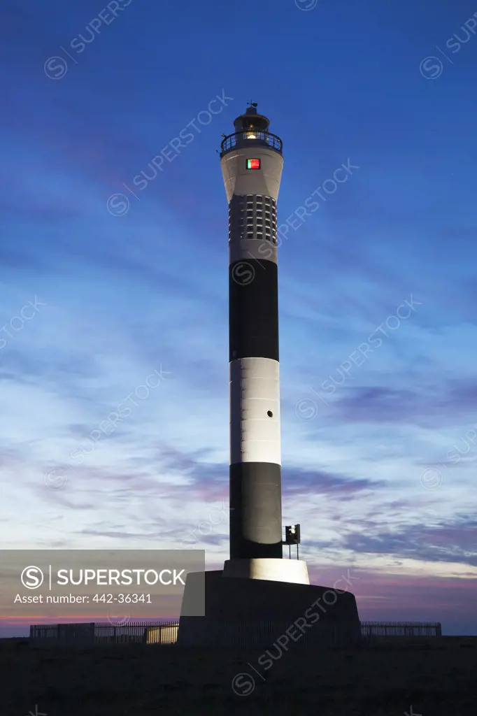 Lighthouse at dusk, New Lighthouse, Dungeness, Kent, England