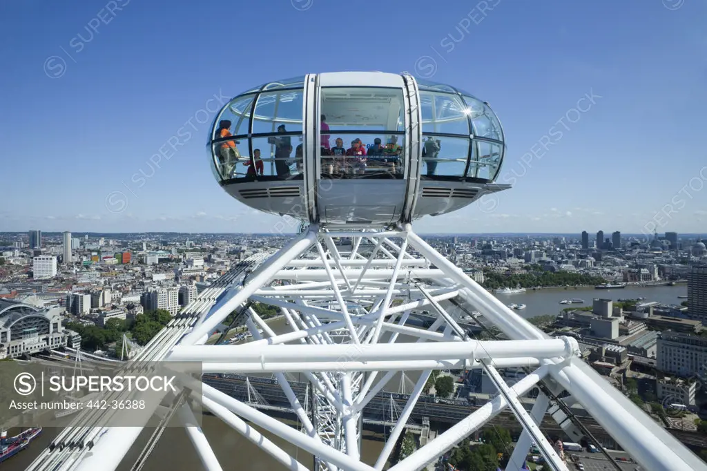 Tourists in a passenger pod of Millennium Wheel, London, England