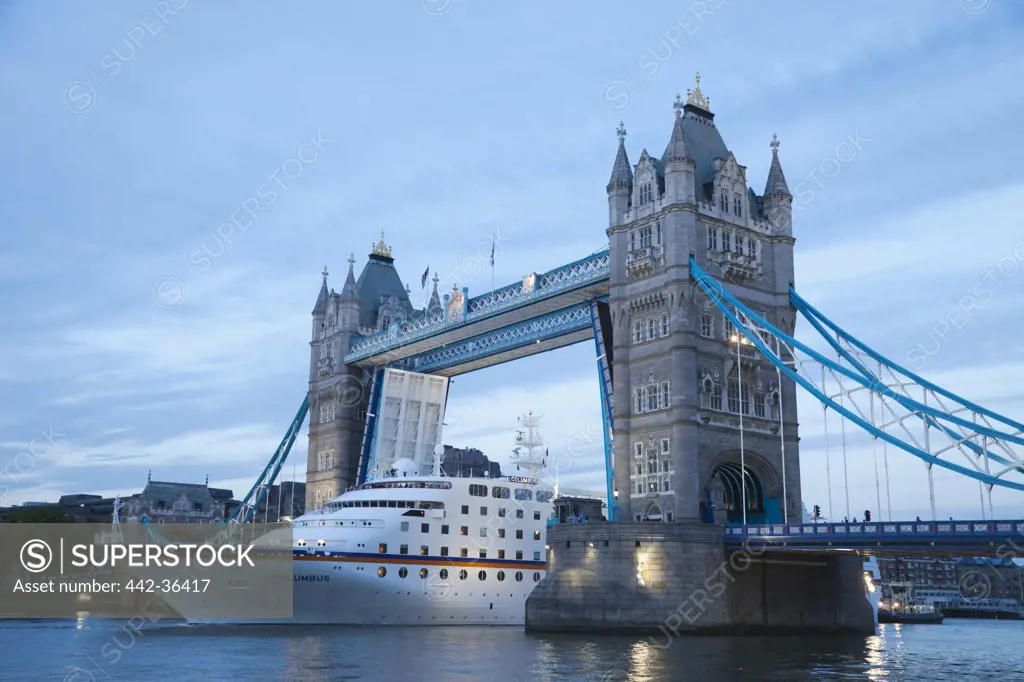 Cruise ship passing under a drawbridge, Tower Bridge, Thames River, London, England