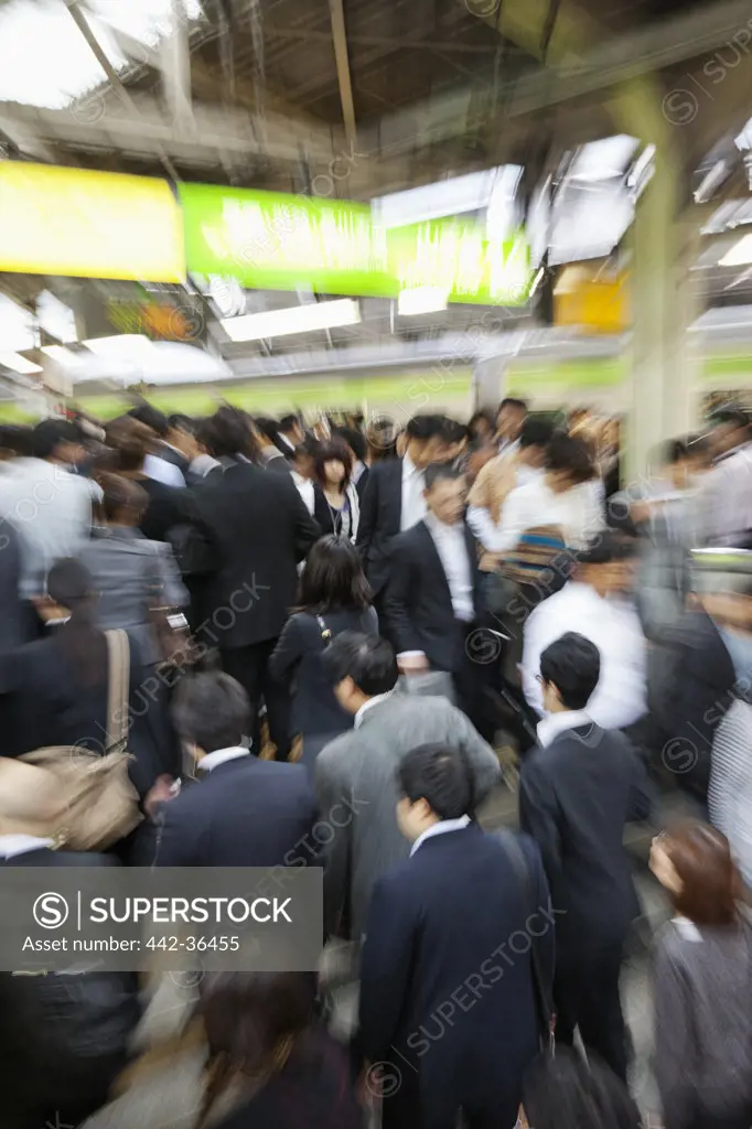 Commuter crowds at Shinjuku Station, Shinjuku Ward, Tokyo, Japan
