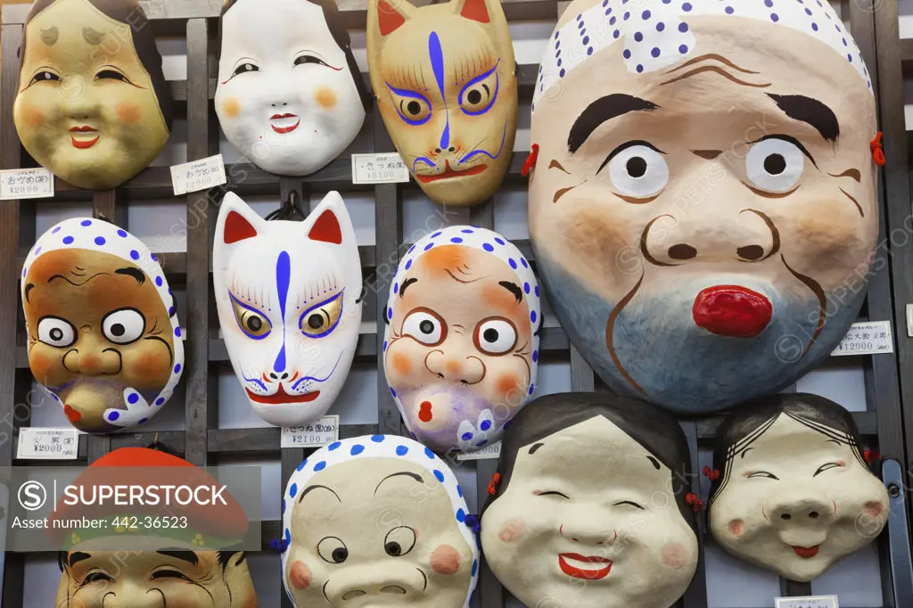 Japanese masks at a market stall, Nakamise Shopping Street, Asakusa Kannon Temple, Asakusa, Tokyo, Japan