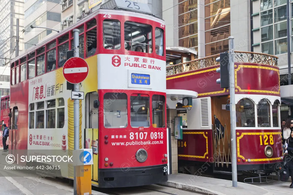 Trams on a street, Hong Kong, China